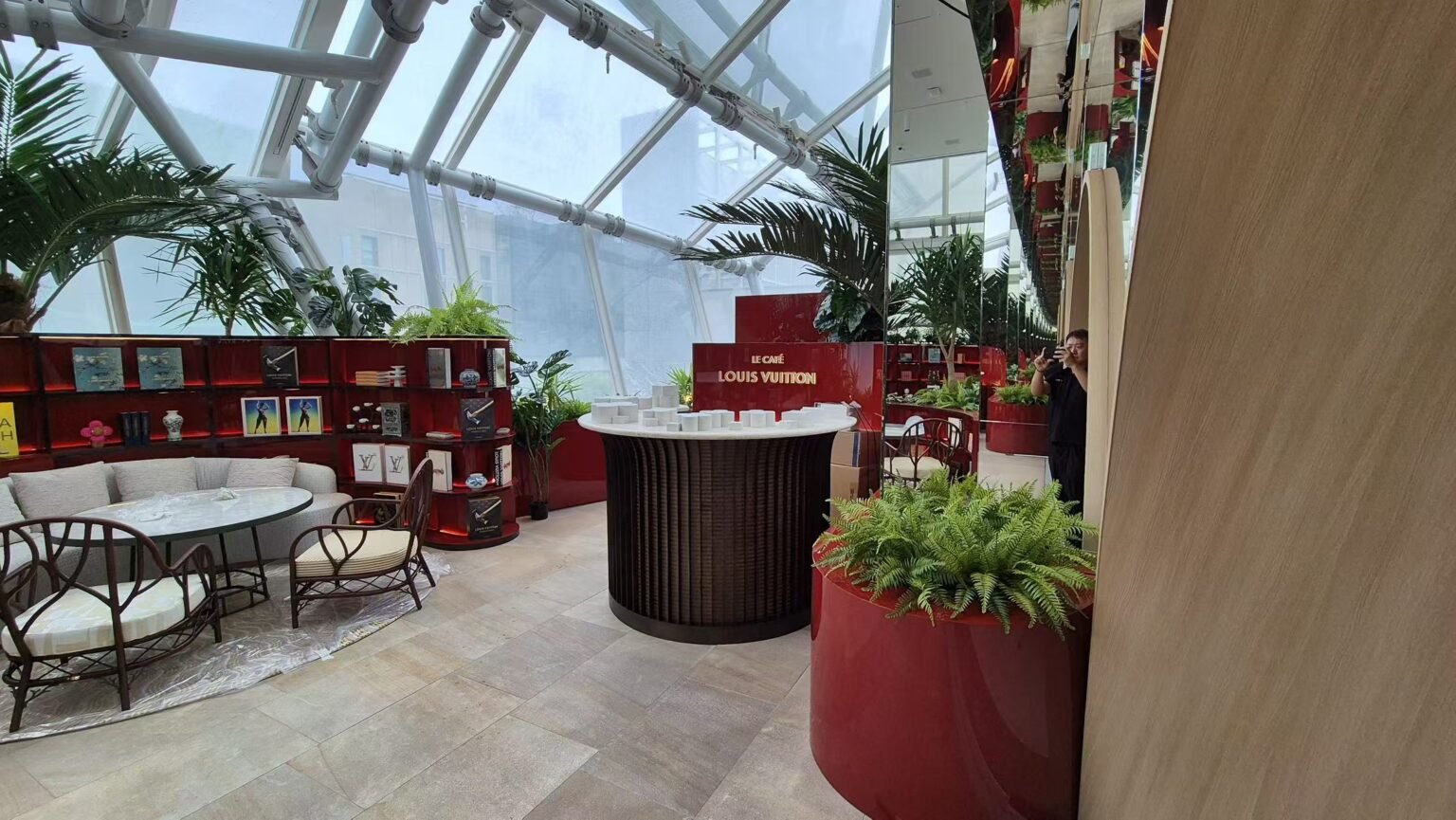 Custom furniture and metal counter by NEXTOP in a Louis Vuitton boutique