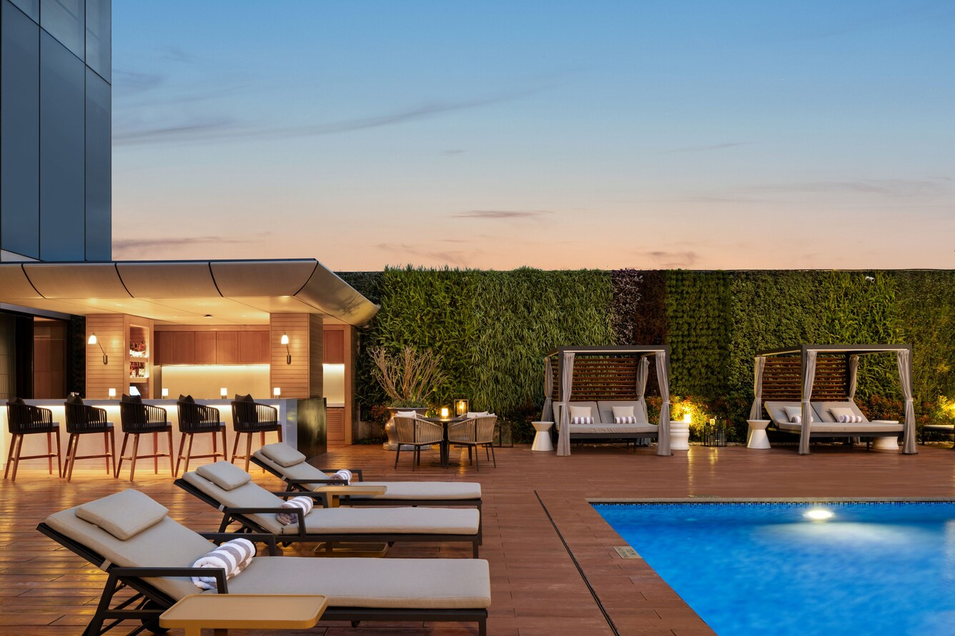 Custom poolside lounge furniture by NEXTOP for a luxury Southeast Asia resort